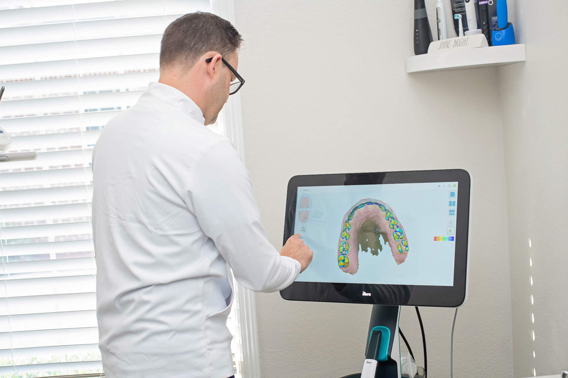 Dr. Prentice using iTero digital scanner technology